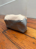 Pod Pouch in veg tan leather with pewter metallic