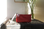Nomadic Pouch red hair with silver