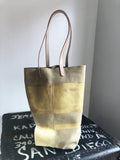 Paper Bag sand suede with gold stripe